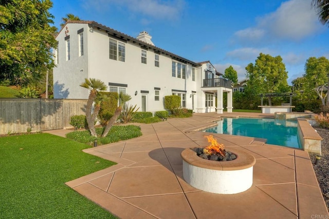 1664 Aryana Dr, Encinitas, CA 92024 - view of pool with a patio, an outdoor fire pit, and a yard