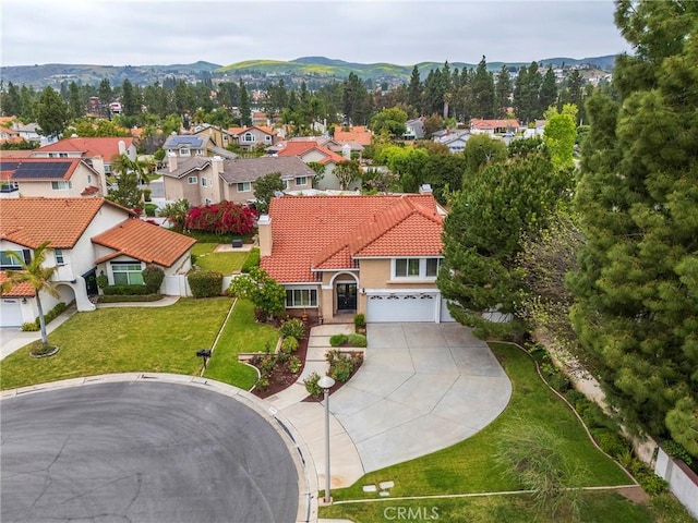 birds eye view of property with a residential view