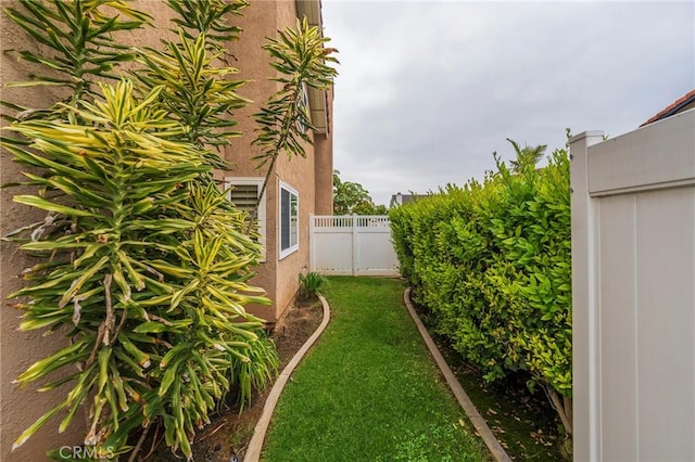 view of yard featuring fence