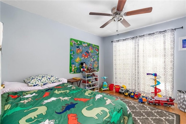 11947 Vivienda Ct, Grand Terrace, CA 92313 - bedroom with ceiling fan and wood finished floors
