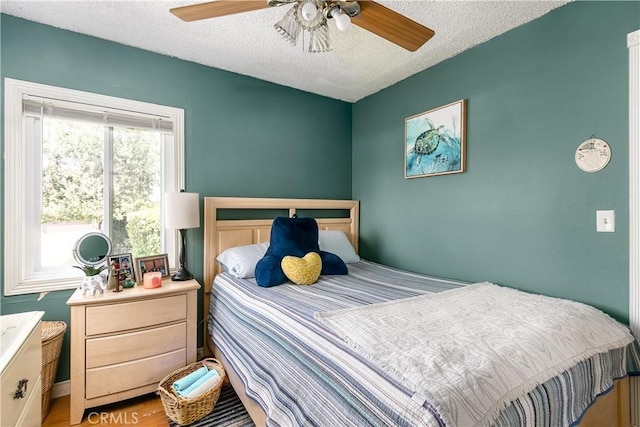 11947 Vivienda Ct, Grand Terrace, CA 92313 - bedroom with ceiling fan and a textured ceiling