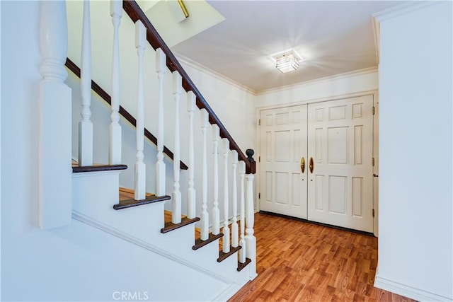 506 W Sierra Madre Blvd Unit D, Sierra Madre, CA 91024 - foyer featuring crown molding, wood finished floors, and stairway