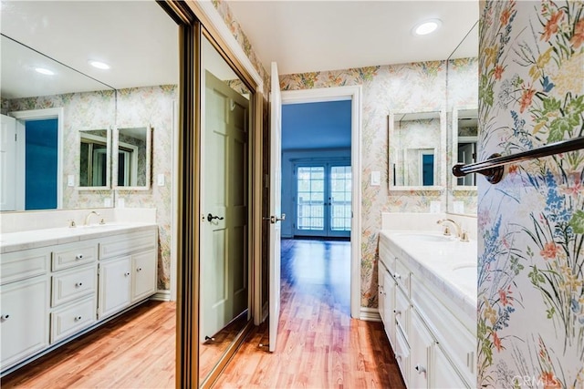 506 W Sierra Madre Blvd Unit D, Sierra Madre, CA 91024 - bathroom with french doors, wallpapered walls, wood finished floors, and vanity