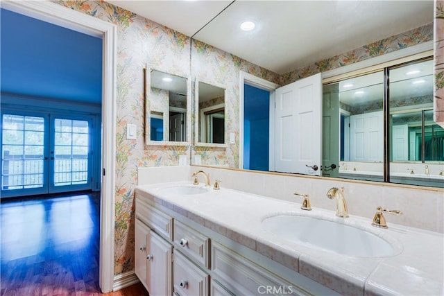 506 W Sierra Madre Blvd Unit D, Sierra Madre, CA 91024 - bathroom with wallpapered walls, a sink, and wood finished floors