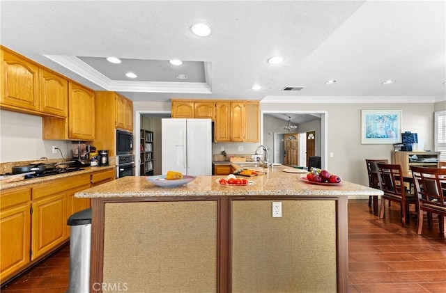 kitchen with crown molding, dark wood-style flooring, black appliances, and a sink