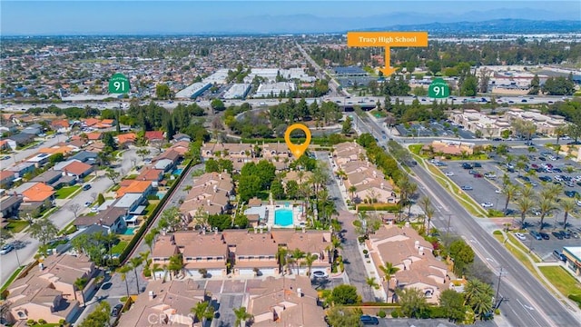 drone / aerial view with a mountain view and a residential view