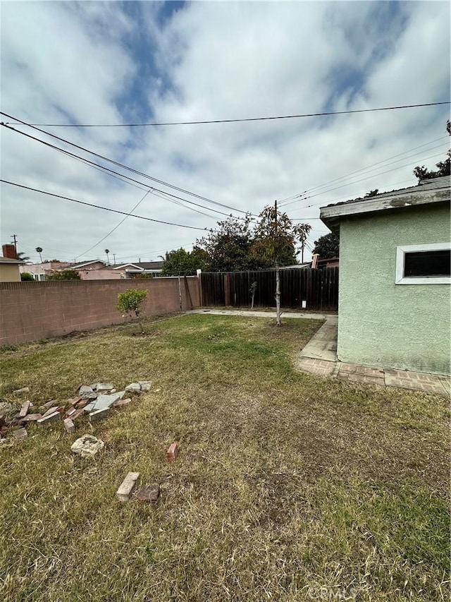 view of yard with fence
