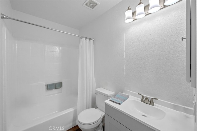 781 Arbula Dr, Crestline, CA 92325 - full bathroom featuring shower / bath combo, visible vents, a textured wall, toilet, and vanity