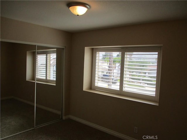 22956 Akwo Cir, Wildomar, CA 92595 - unfurnished bedroom featuring carpet, a closet, and baseboards