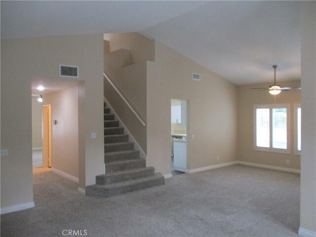 22956 Akwo Cir, Wildomar, CA 92595 - unfurnished living room with stairs, carpet, ceiling fan, and baseboards