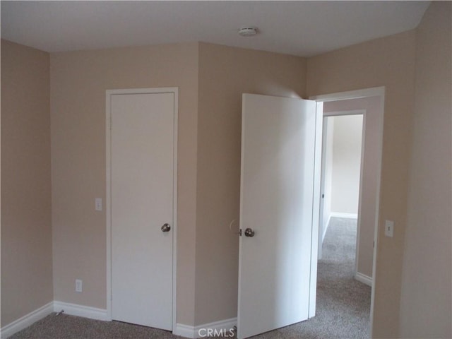 22956 Akwo Cir, Wildomar, CA 92595 - unfurnished bedroom featuring carpet and baseboards