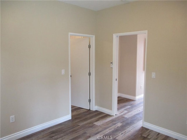 22956 Akwo Cir, Wildomar, CA 92595 - empty room featuring dark wood-type flooring and baseboards