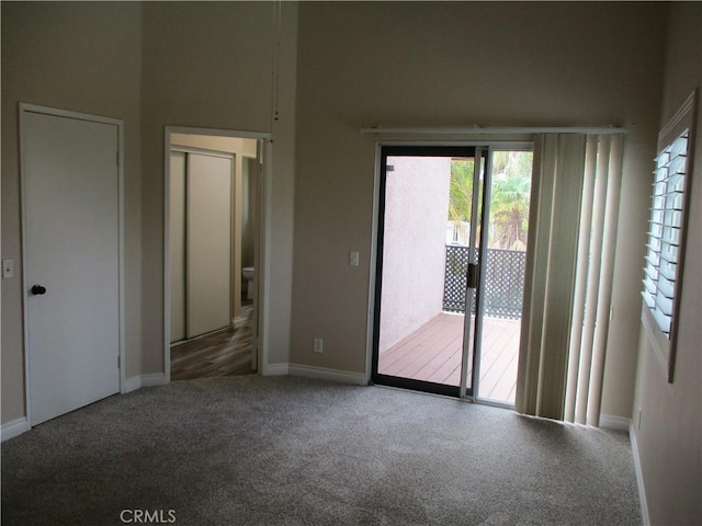22956 Akwo Cir, Wildomar, CA 92595 - spare room with carpet floors, baseboards, and a towering ceiling