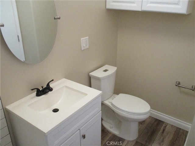 22956 Akwo Cir, Wildomar, CA 92595 - half bath with wood finished floors, toilet, vanity, and baseboards
