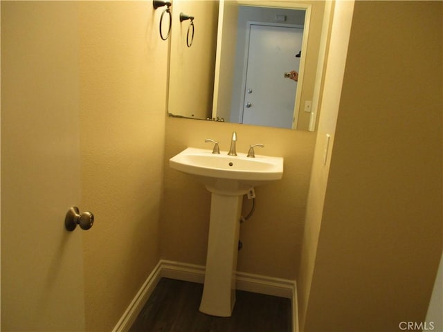 22956 Akwo Cir, Wildomar, CA 92595 - bathroom with wood finished floors, baseboards, and a sink
