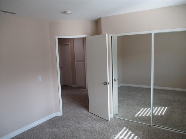 22956 Akwo Cir, Wildomar, CA 92595 - unfurnished bedroom featuring carpet, a closet, and baseboards