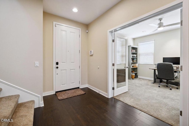 foyer entrance featuring hardwood / wood-style floors, baseboards, ceiling fan, stairway, and recessed lighting