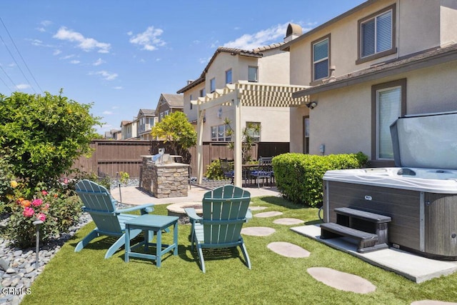 view of yard featuring a fenced backyard, central AC unit, a patio area, exterior kitchen, and a hot tub