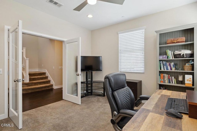 carpeted office space featuring ceiling fan, french doors, recessed lighting, baseboards, and visible vents