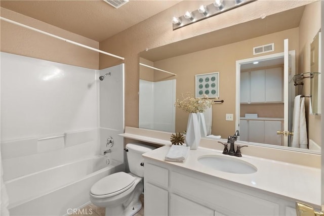 bathroom with toilet, visible vents, bathtub / shower combination, and vanity