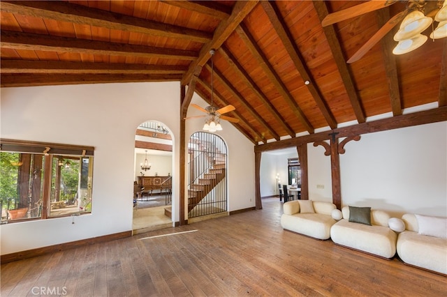 32140 Windrush Rd, Agua Dulce, CA 91390 - unfurnished living room featuring baseboards, wood ceiling, beamed ceiling, ceiling fan with notable chandelier, and hardwood / wood-style floors