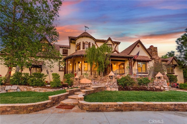 32140 Windrush Rd, Agua Dulce, CA 91390 - view of front facade featuring a tiled roof, a yard, and stucco siding