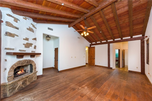 32140 Windrush Rd, Agua Dulce, CA 91390 - unfurnished living room featuring beam ceiling, baseboards, hardwood / wood-style floors, wooden ceiling, and a fireplace