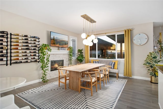 33081 Yucca St, Temecula, CA 92592 - dining area featuring wood finished floors and a fireplace