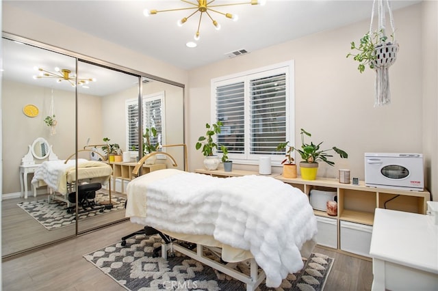 33081 Yucca St, Temecula, CA 92592 - bedroom featuring a chandelier, a closet, wood finished floors, and an office area