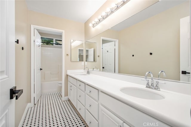 33081 Yucca St, Temecula, CA 92592 - full bathroom featuring baseboards, double vanity, toilet, and bathing tub / shower combination