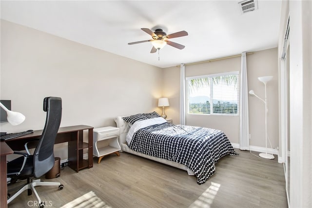 33081 Yucca St, Temecula, CA 92592 - bedroom featuring wood finished floors, a desk, a ceiling fan, and baseboards