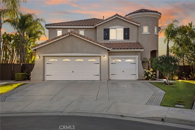 33081 Yucca St, Temecula, CA 92592 - mediterranean / spanish home with a tiled roof, concrete driveway, stucco siding, and an attached garage