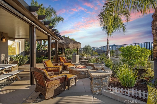 33081 Yucca St, Temecula, CA 92592 - view of patio / terrace featuring an outdoor fire pit and fence