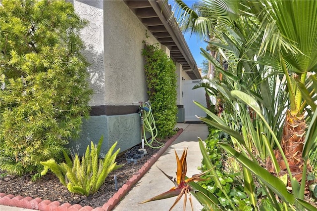 view of property exterior with stucco siding