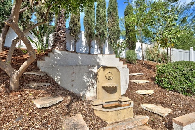 entry to storm shelter with fence