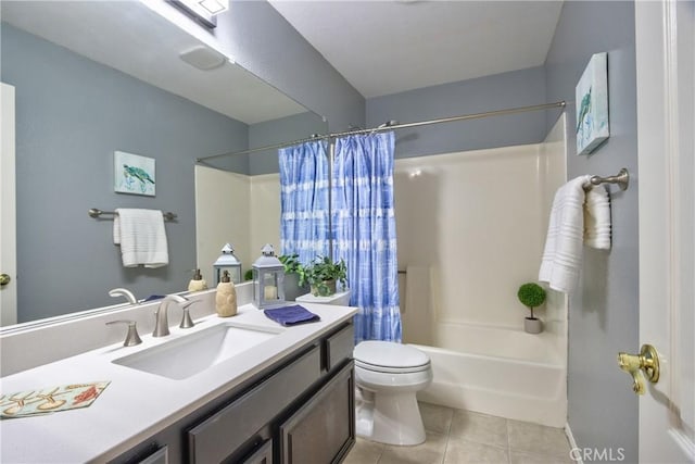 bathroom with shower / tub combo with curtain, tile patterned floors, vanity, and toilet