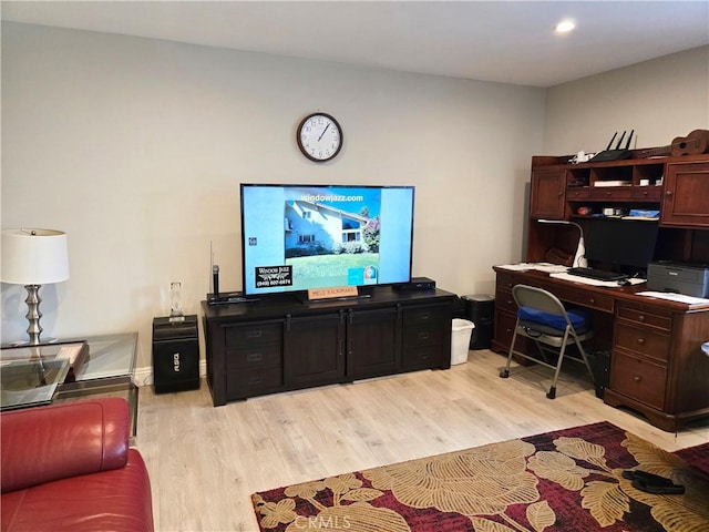 office with light wood-style floors