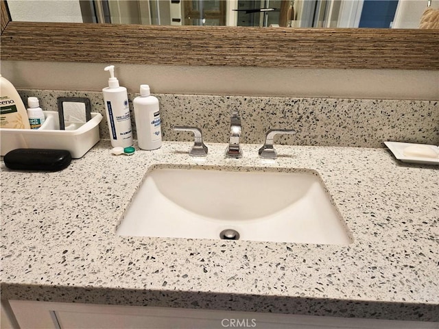 interior details featuring a sink