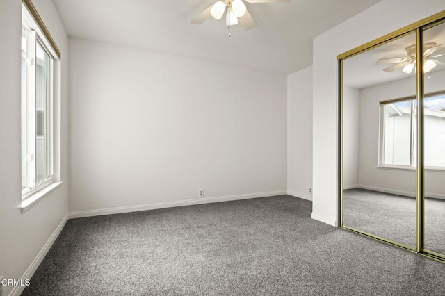 2515 Harbor Blvd Unit 1, Ventura, CA 93001 - unfurnished bedroom with carpet flooring, multiple windows, and ceiling fan