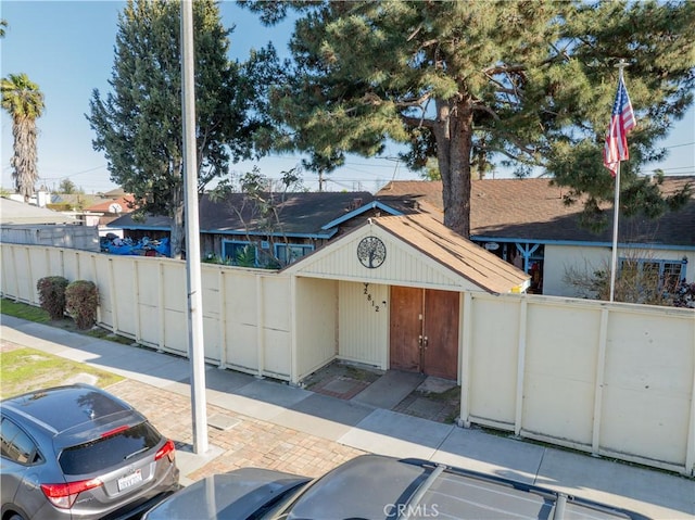 view of front of home with fence private yard