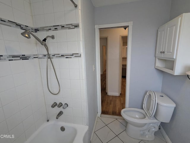 636 N C St, Oxnard, CA 93030 - bathroom with toilet, baseboards, tile patterned floors, and bathtub / shower combination