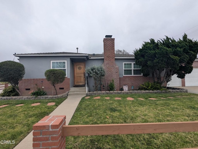 636 N C St, Oxnard, CA 93030 - ranch-style house with brick siding, a chimney, and a front yard