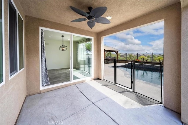 view of patio with ceiling fan