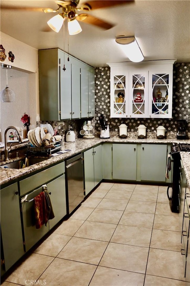 216 Barros St, Patterson, CA 95363 - kitchen featuring light tile patterned floors, a ceiling fan, a sink, stainless steel appliances, and backsplash