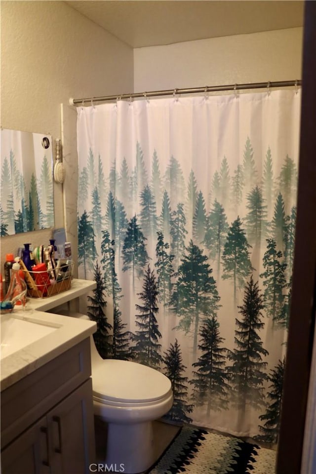 216 Barros St, Patterson, CA 95363 - bathroom with toilet and vanity