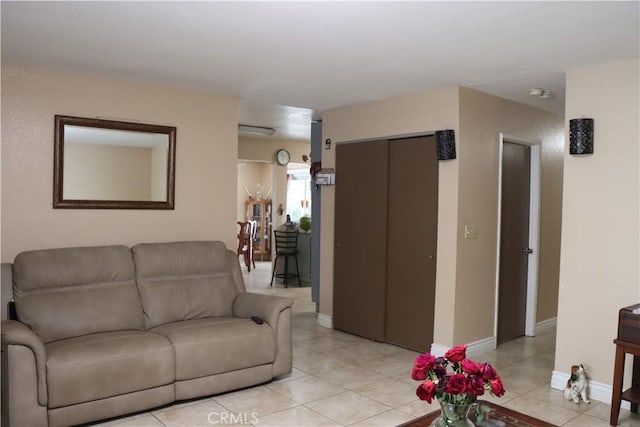 216 Barros St, Patterson, CA 95363 - living area with light tile patterned flooring and baseboards
