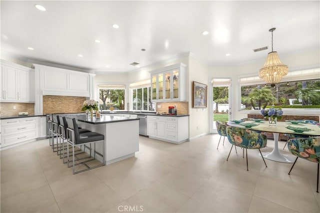 5366 Collingwood Cir, Calabasas, CA 91302 - kitchen featuring dark countertops, healthy amount of natural light, dishwasher, tasteful backsplash, and recessed lighting