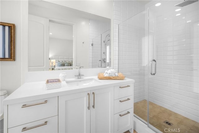 5366 Collingwood Cir, Calabasas, CA 91302 - bathroom with a shower stall, vanity, and toilet