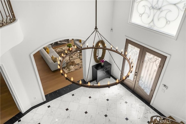5366 Collingwood Cir, Calabasas, CA 91302 - foyer featuring a chandelier, french doors, and a high ceiling