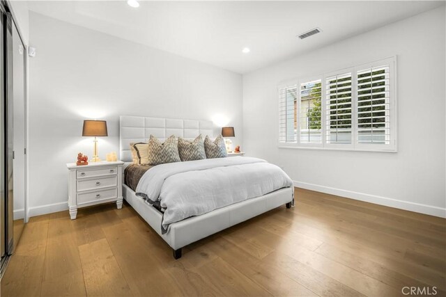 5366 Collingwood Cir, Calabasas, CA 91302 - bedroom featuring baseboards, hardwood / wood-style flooring, and recessed lighting